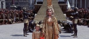 The filmmakers explore various ideas of femininity through Cleopatra's various roles of siren, mother, and queen. 