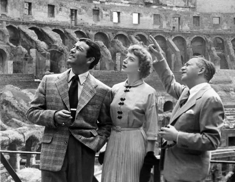 In Rome for the filming of Quo Vadis, Robert Taylor, Deborah Kerr and director Mervyn LeRoy take a tour of the Colosseum