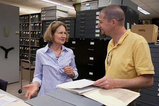 Gail Troussoff Marks ('73) and Karl Qualls, associate professor of history at Dickinson College, look over documents that Marks has contributed to the Dickinson archives. source: Dickinson College flickr http://bit.ly/16UZXd0