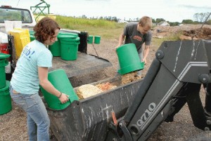 Dickinson Farm Student Volunteers Dump Compost Waste for Incorporation into a Compost Pile