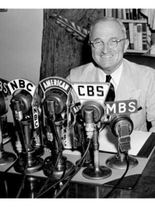 Truman in front of multiple radio microphones (Courtesy of Time Magazine)