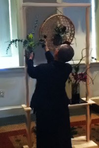 Ikebana Master Anna Nakada arranges flowers during a demonstration highlighting an ancient form of Japanese art. The flowers and branches she used were culled from the Dickinson campus.