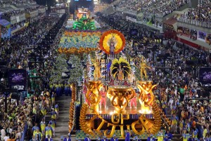 TOPSHOTS Revelers of the Unidos da Tijuca samba school perform during the second night of carnival parade at the Sambadrome in Rio de Janeiro, Brazil on March 4, 2014. AFP PHOTO / TASSO MARCELO LEALTASSO MARCELO LEAL/AFP/Getty Images ORG XMIT: 290
