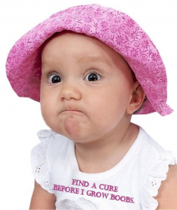 baby with shirt saying find a cure