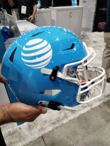Football helmet with screen for deaf players to see the play call.