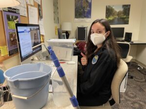 Photo shows Claudia giving a thumbs up to the camera just before the training call began