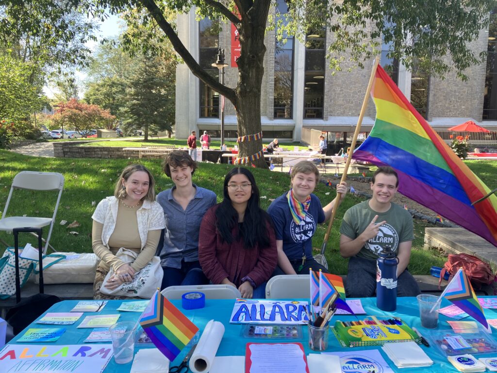 The ALLARM table is all set up, decked out in rainbows and ready for attendees