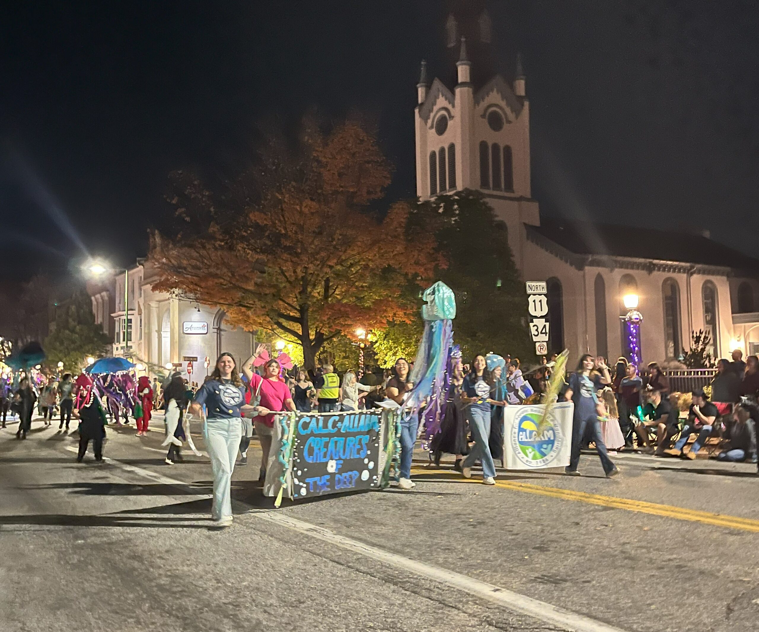 Cover image shows the halloween parade float