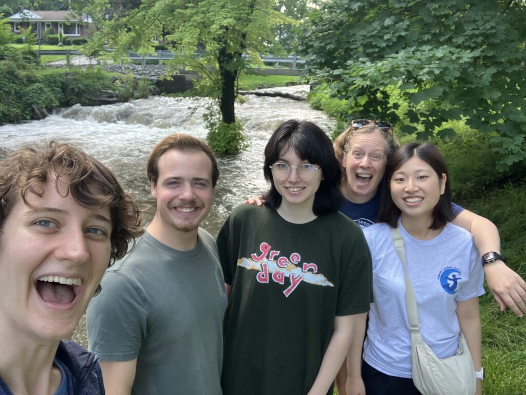 Team photo taken at the LeTort by the waterfall