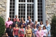 Group on steps with window