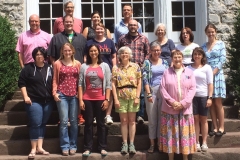 group on steps of old west