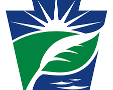 PA DEP Logo - A sun is rising over a green hill. A leaf is superimposed on top the hill, and separates the hill from the water that is below the leaf