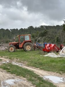 Image of an old orange tractor at Terracoupa.