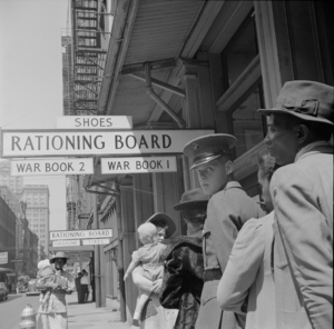 Citizens wait outside of their local War Rationing Board office