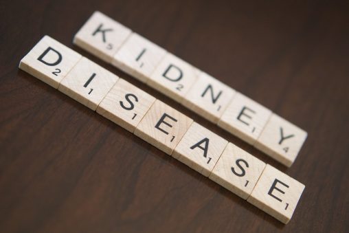 Scrabble tiles spelling out "kidney disease"