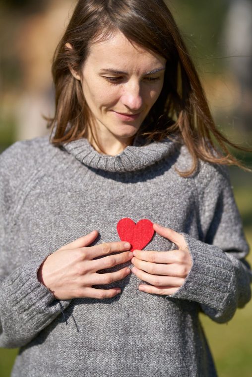 Women holding heart